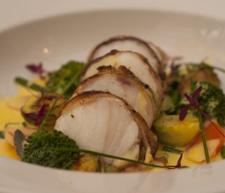 Parma Wrapped Monkfish with Crispy New Potatoes & Kale
